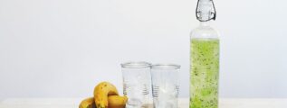 fruit juice and fruits on top of table